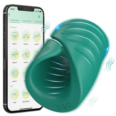 A green silicone penis massager with a sleek design, shown alongside a smartphone displaying its control app.