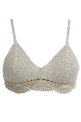 A beige woolen bralette with a geometric pattern.