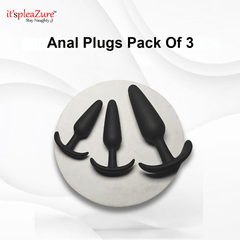 Pack of three black anal plugs on a white background with 'it's pleAZure' branding.
