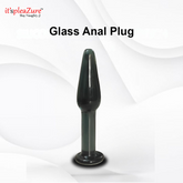 Glass anal plug with 'it's pleazure' branding on a white background