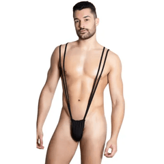 This image features a model wearing the Itspleazure Black Mankini Penis Pouch, a men's lingerie item. The pouch is black, free-size, and designed with multiple straps that provide a secure fit.