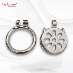 Two metallic objects, one circular and one with a floral design, on a white background.