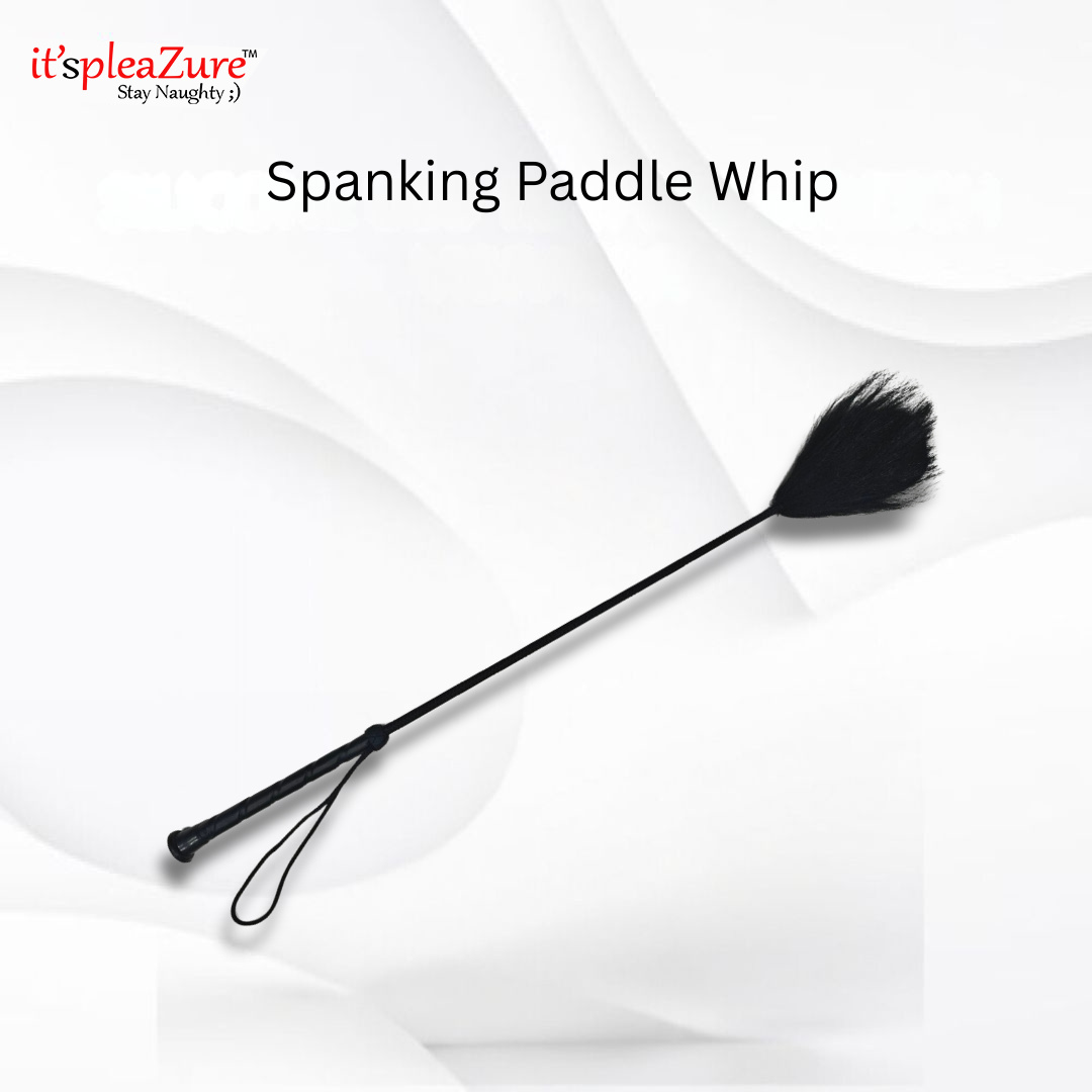 Spanking paddle whip on a white background with 'it's pleaZure' branding.